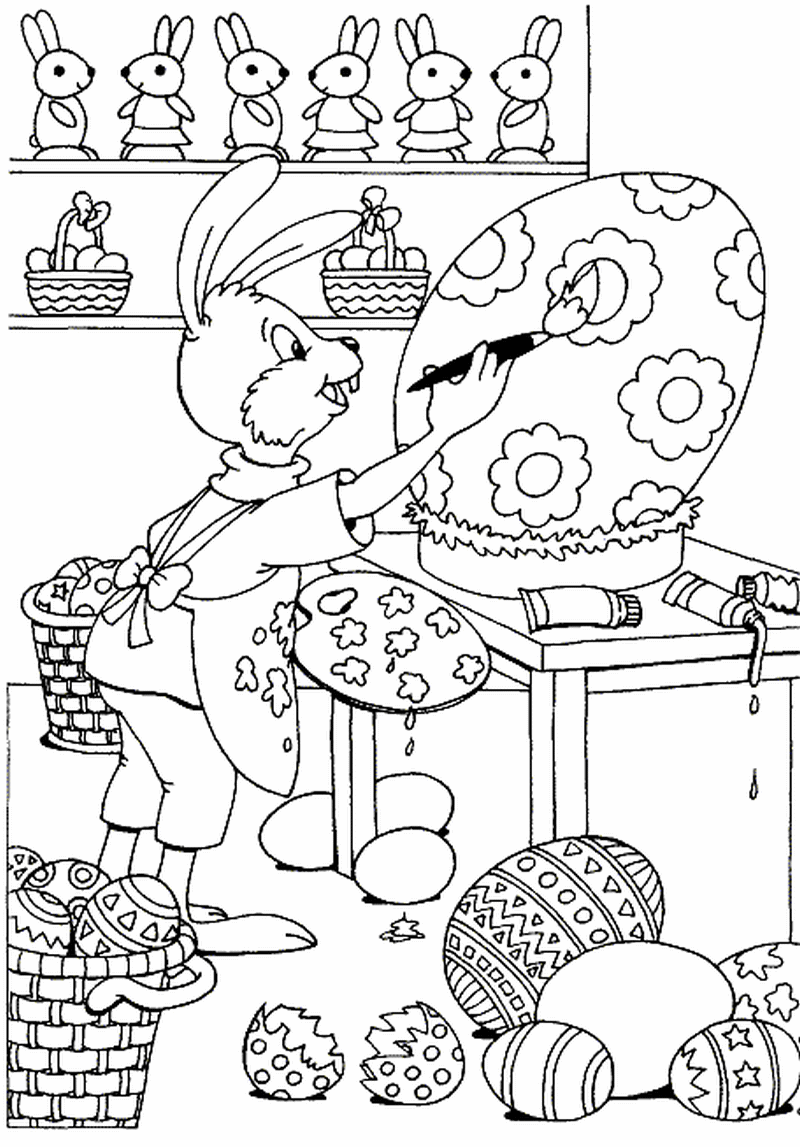 coloriage lapin decorant des oeufs de paques